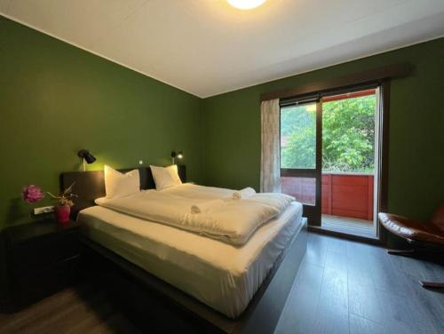 Postel nebo postele na pokoji v ubytování Apartment near beautiful waterfall