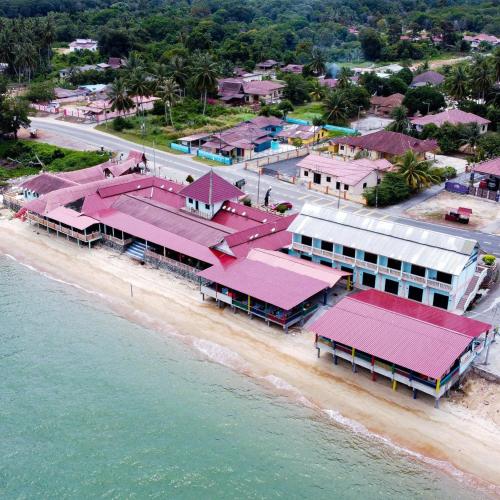 an aerial view of a resort on the beach at DNELAYAN BEACH RESORT in Masjid Tanah