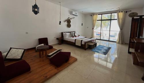 Ένα ή περισσότερα κρεβάτια σε δωμάτιο στο BIANCO AZZURRO Hotel & Restaurant
