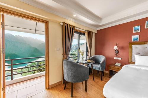 Postel nebo postele na pokoji v ubytování Tiger Sapa hotel