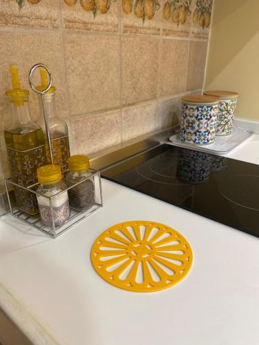 a kitchen counter with a plate on a counter top at Villa Vittoria in Matera