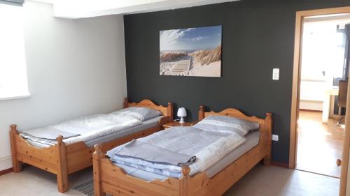Postel nebo postele na pokoji v ubytování Ferienwohnung DaWi Röhrenfurth