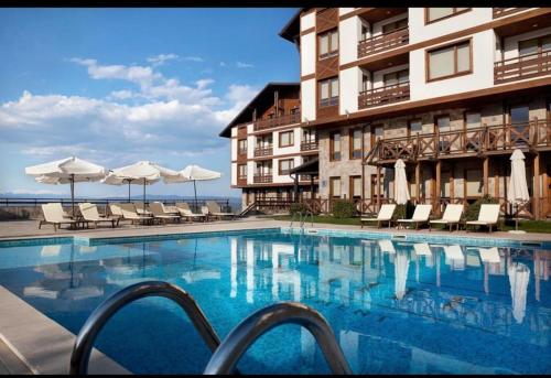 Басейн в или близо до Cosy Appartement Green Life Bansko