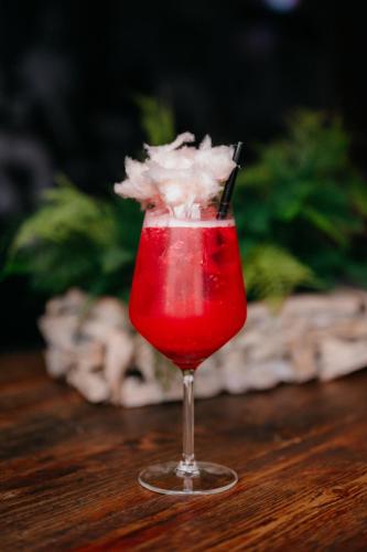 a red drink in a glass on a table at SLEEP WELL 1999 in Tychy