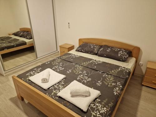 Postel nebo postele na pokoji v ubytování Stan na dan, Loznica