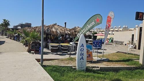 a street sign on the side of a street at Julie's beach house in Voroklini