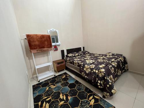 Katil atau katil-katil dalam bilik di Khalish homestay