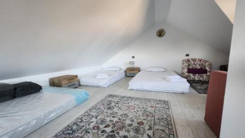Postel nebo postele na pokoji v ubytování Casa cu Roți - Vacanțe în Natură