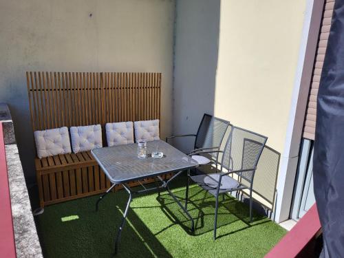 a table and two chairs in a room at Bed & Breakfast Villa Palma in Lovere