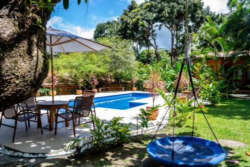 Swimming pool sa o malapit sa Casas Natureza Brasil