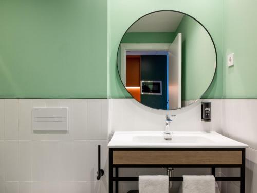 A bathroom at Kora Green City - Aparthotel Passivhaus