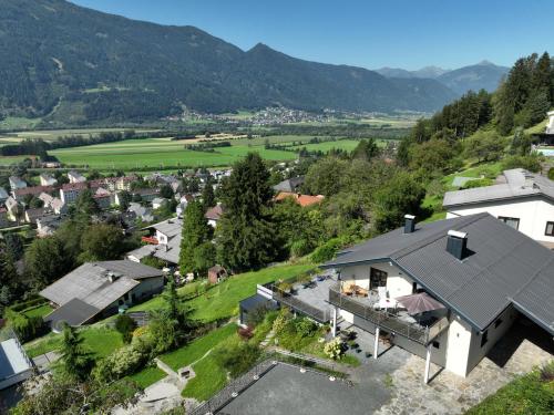 an aerial view of a house in a village at Ferienwohnung Pirker in Spittal an der Drau