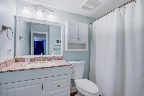 a bathroom with a toilet and a sink and a shower at NTBSR3404 St Regis 3404 in North Topsail Beach
