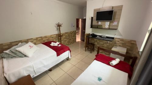  Hotel Marajó - Turismo de Experiência -  Room  picture :   Minibar    Shower    TV                         