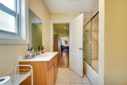 a bathroom with a sink and a shower at Cozy Home - 2 Mi to Walk of Fame and Griffith Park! in Los Angeles