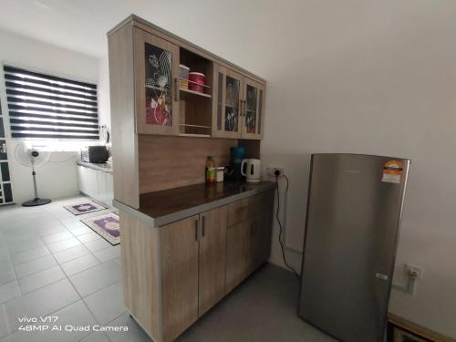 Dapur atau dapur kecil di Bambom Homestay SP