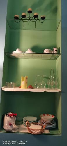 B&B Le Casette Di Lùにあるキッチンまたは簡易キッチン