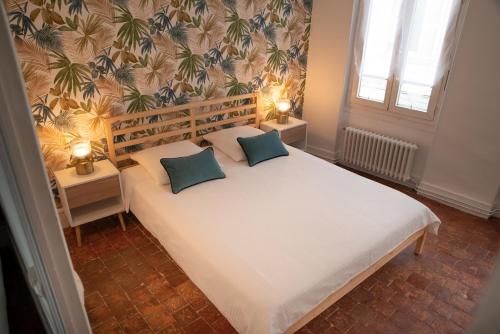 Maison de ville solognote tesisinde bir odada yatak veya yataklar