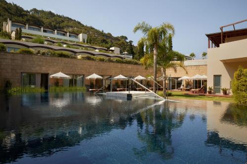 a view of the pool at a resort at Elite Suites by Rhodes Bay in Ixia