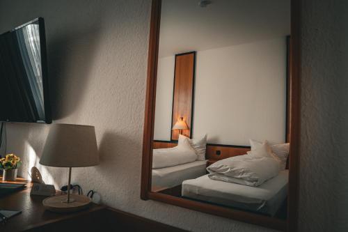 Postel nebo postele na pokoji v ubytování E&D Hotel Rodgau
