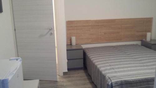 Ένα ή περισσότερα κρεβάτια σε δωμάτιο στο Beda Ragusa