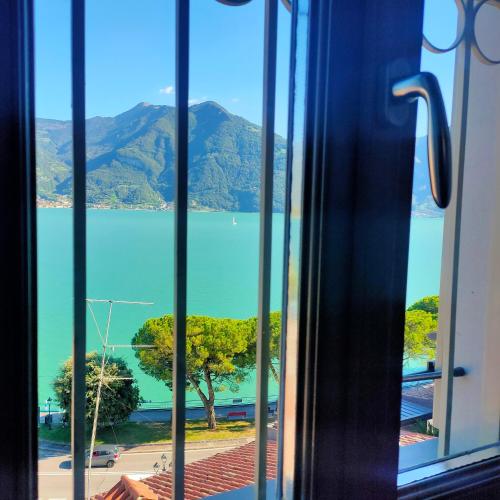 a view of a lake from a train window at Casa Marina in Lovere