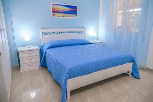 A bed or beds in a room at Villa Milla