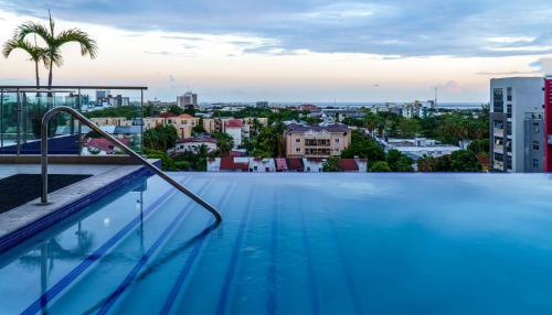 a swimming pool with a view of a city at Luxury Apartment at 20 South in Kingston