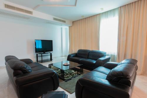 Zona de estar de The Penthouse Suites Hotel