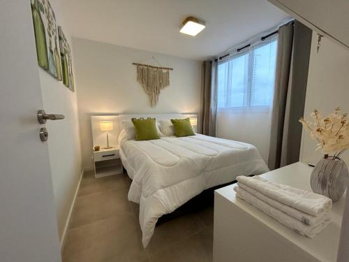 Кровать или кровати в номере Apartamento céntrico con garage