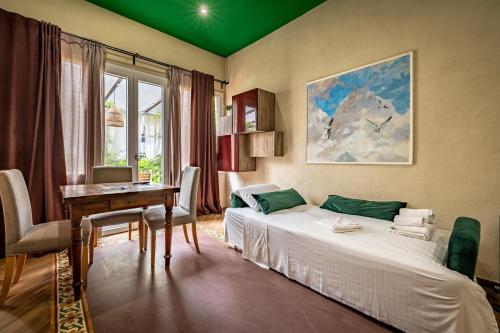 Posteľ alebo postele v izbe v ubytovaní Roommo Apartments San Gallo