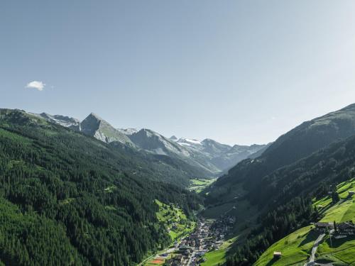 an aerial view of a valley with mountains at Landhaus Geisler in Tux