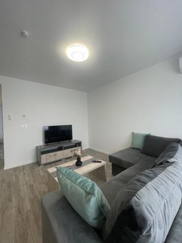 Телевизор и/или развлекательный центр в Comfort & Luxury Apartaments PNMresidence