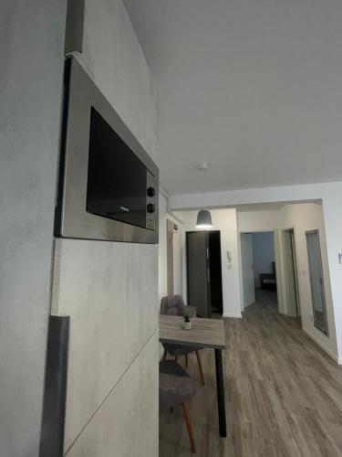 Телевизор и/или развлекательный центр в Comfort & Luxury Apartaments PNMresidence