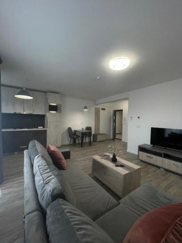 Гостиная зона в Comfort & Luxury Apartaments PNMresidence
