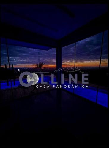 Ein Schild, auf dem steht, Coline mit Sonnenuntergang im Hintergrund in der Unterkunft La Colline - Casa Panorâmica in Guaraciaba do Norte