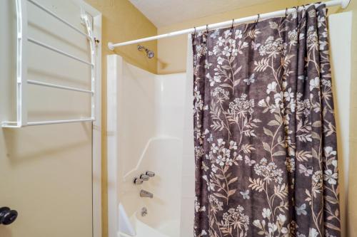 a shower curtain in a bathroom with a shower at Walk to Slopes! Pet-Friendly Beech Mtn Condo in Beech Mountain