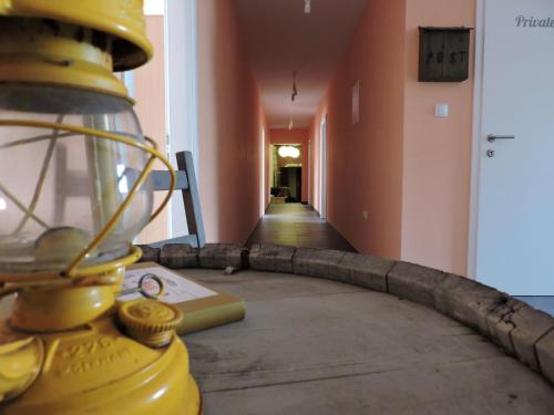 a room with a yellow object on a table at Hostel Marina Trogir in Trogir