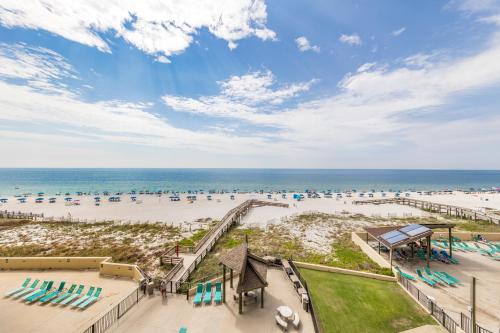 an aerial view of a beach with a boardwalk and the ocean at Phoenix II 2042 in Orange Beach