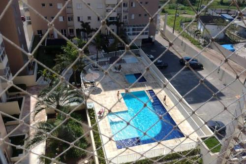 A view of the pool at Apartamento em itanhaem or nearby