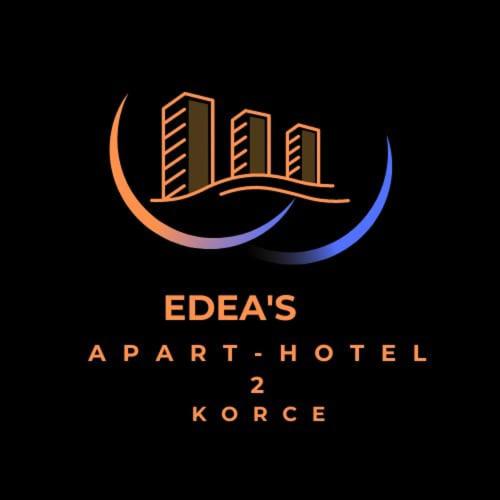 um logótipo para um hotel com edifícios na lua em Korce Edea's 2 ApartHotel em Korçë