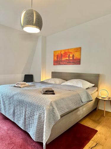 Postel nebo postele na pokoji v ubytování Modernes City-Apartment mit Blick in den Park und 2 Bäder H9