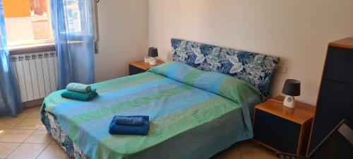 Ліжко або ліжка в номері Roman Riviera