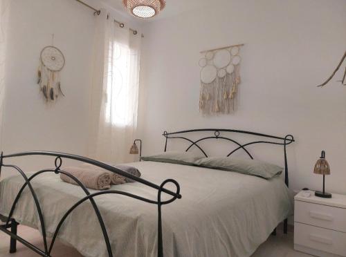 En eller flere senge i et værelse på Marzamemi House - Borgo 84