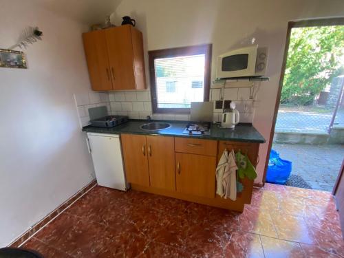 Una cocina o zona de cocina en Apartmánová chata Martina