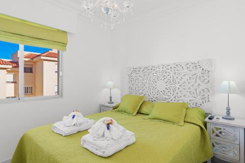 Ένα ή περισσότερα κρεβάτια σε δωμάτιο στο CristiSmart Home Hi-End Services Media Streaming