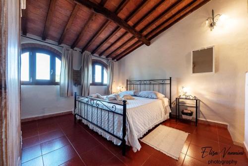 A bed or beds in a room at Casa Marylou
