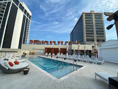 a swimming pool on the roof of a building at Nobu Hotel at Caesars Atlantic City in Atlantic City
