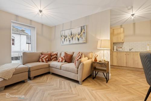 a living room with a couch and a table at Luxury Apartment - Roe Getaway Limavady in Limavady