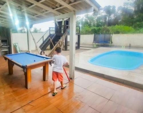 Kolam renang di atau dekat dengan Casa de descanso sonho de infancia